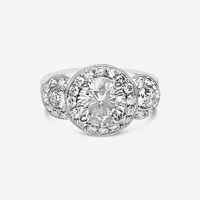 18kt round diamond halo engagement ring