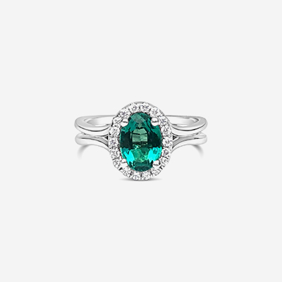 14kt oval emerald and halo diamond ring