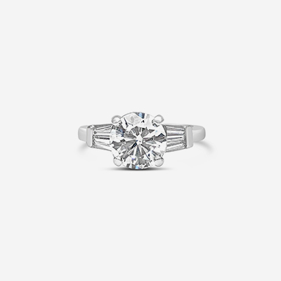 platinum round and baguette diamond engagement ring