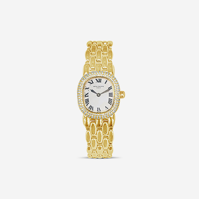 18kt patek philippe with diamond bezel