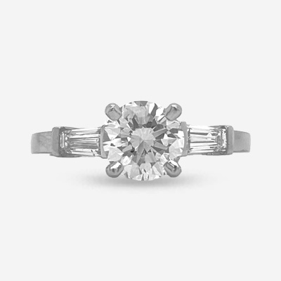 Platinum Round Center and Baguette Diamond Engagement Ring