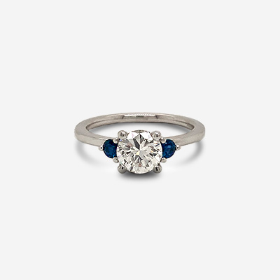 Platinum Round Center Diamond and Sapphire Ring