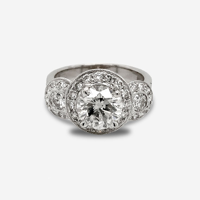 18kt White Gold Three Stone Diamond Ring with Halo