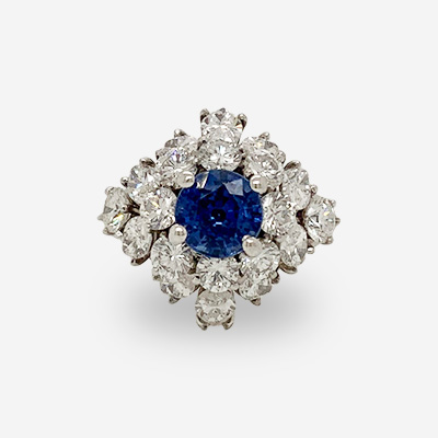Platinum Round Center Sapphire and Diamond Ring