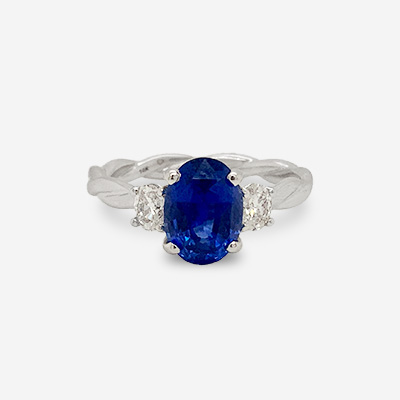 14KT White Gold Oval Sapphire and Diamond Twisted Band Ring