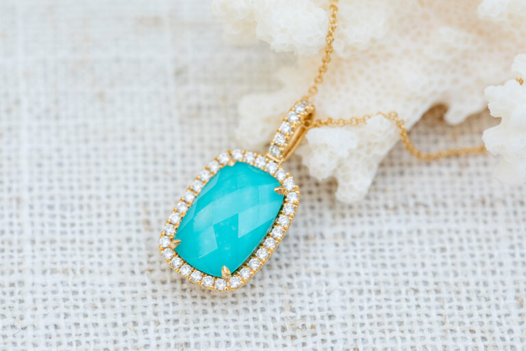 Necklace with blue stone and diamonds at EB Horn Jewelry Store in Boston