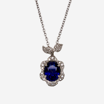 Platinum Oval Sapphire and Diamond Pendant