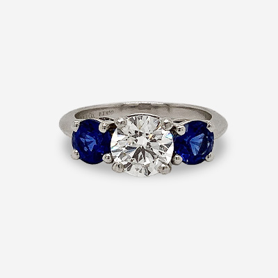 Platinum Round Diamond and Sapphire Ring