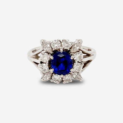 14KT White Gold Center Sapphire and Diamond Halo Ring