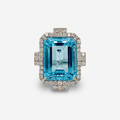 18KT White Gold Light Blue Topaz and Diamond Ring
