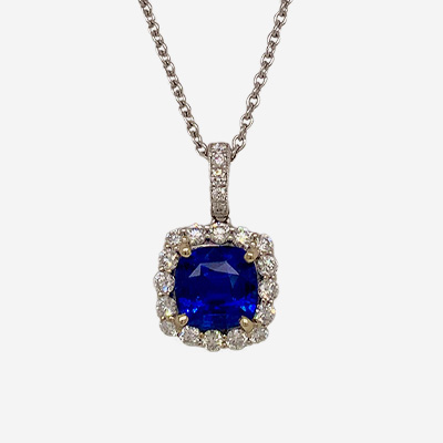 18KT White Gold Cushion Cut Sapphire and Diamond Halo Pendant