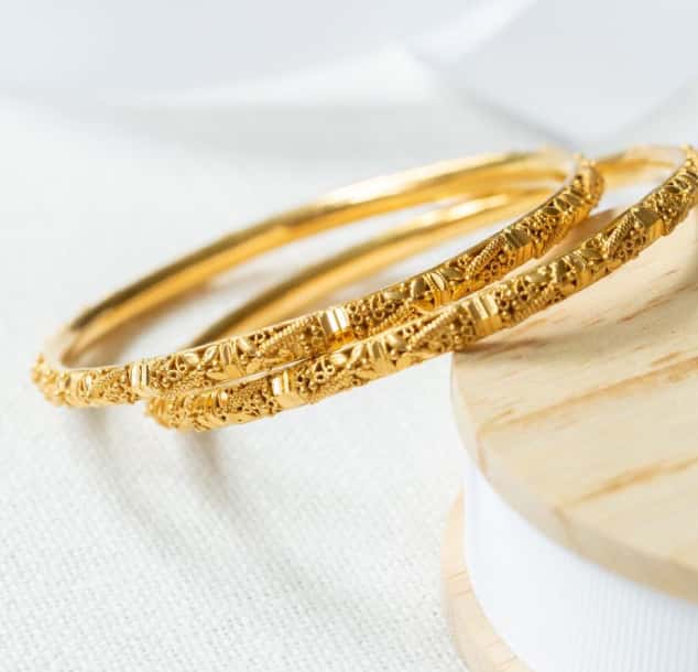 stack of gold bangle bracelets