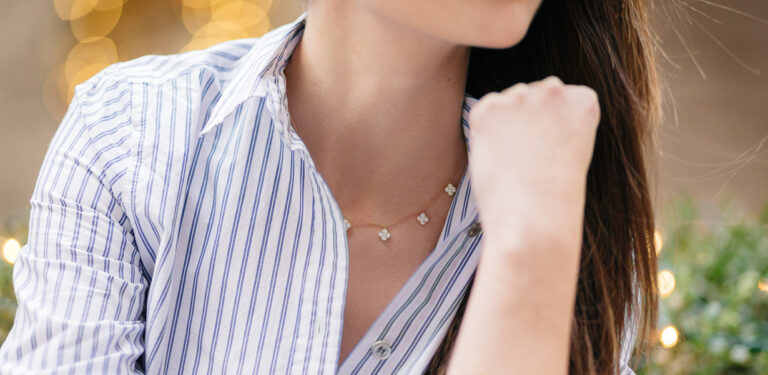 Woman wearing diamond necklace from EB Horn Jewelry Store in Boston